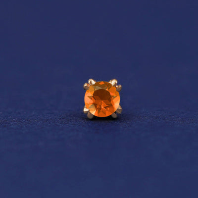 Front facing view of a 14k yellow gold orange Fire Opal Flat Back Earring