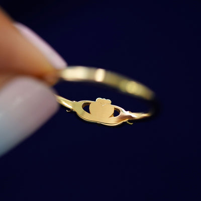 Underside view of a solid 14k gold Thin Gemstone Claddagh Ring