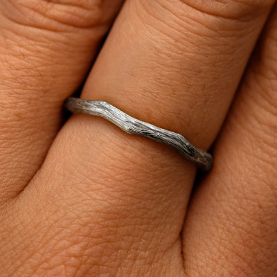 Close up view of a model's fingers wearing a 950 platinum Branch Band