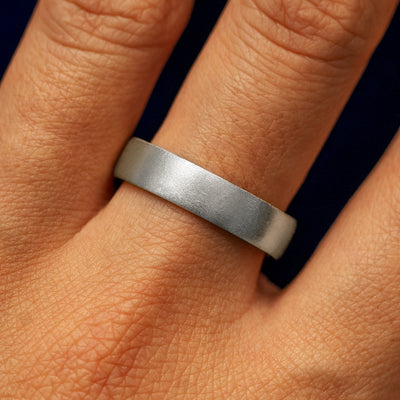 Close up view of a model's fingers wearing a Platinum Mix Matte Band