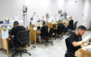 Our jewelers at their jewelers benches in our NYC studio