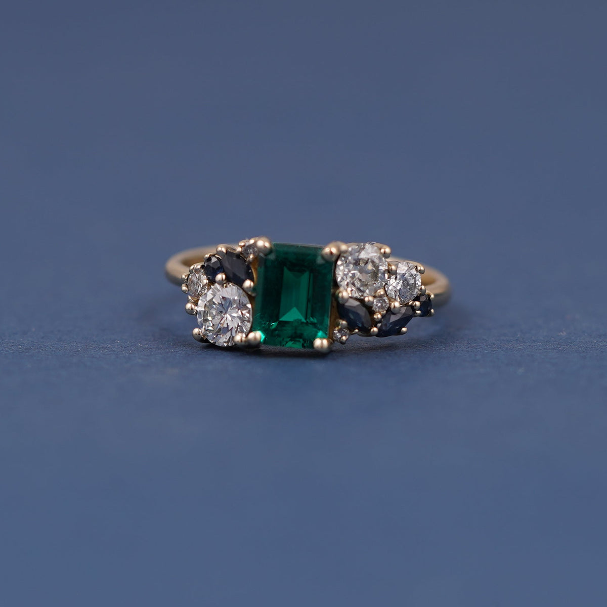 14k Yellow Gold and Emerald-cut Lab Emerald with Cluster of Sapphires and Diamonds Custom Ring