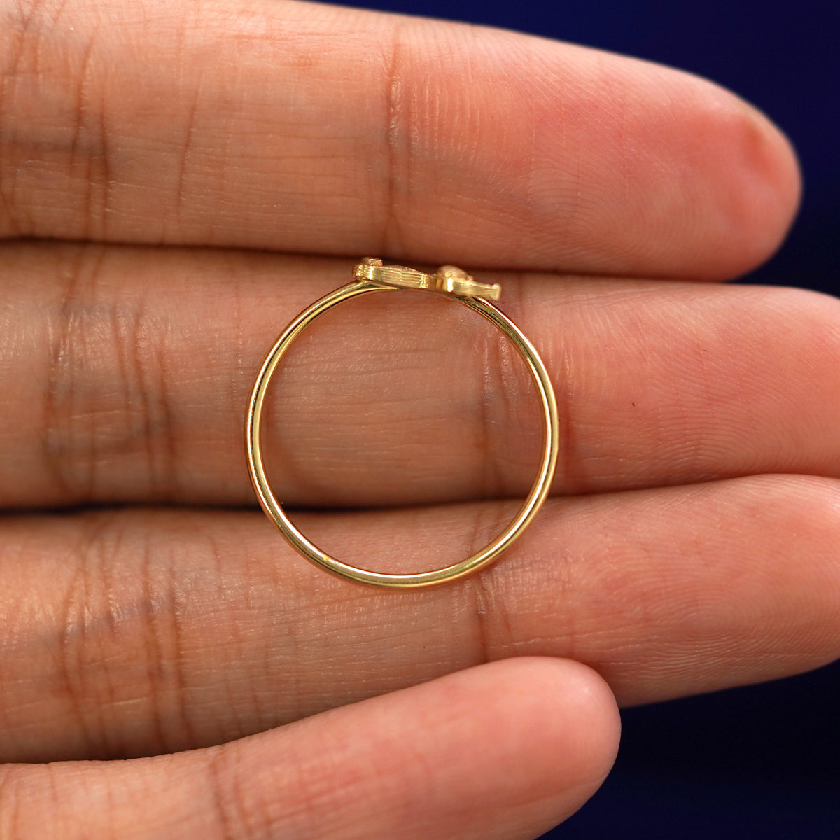 Underside view of a solid 14k gold Dog Ring