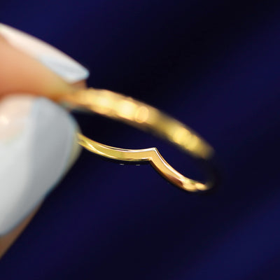 Underside view of a solid 14k gold Diamond Chevron Band