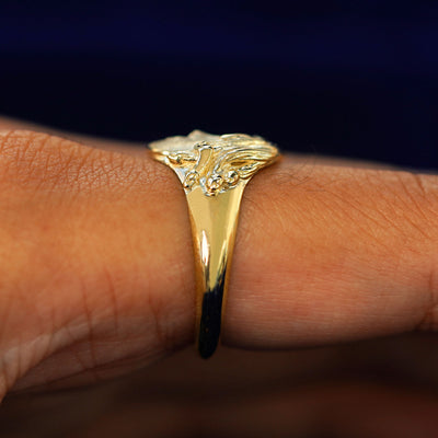 Other Side view of a Medusa Ring on a model's finger to show the details of her snake hair