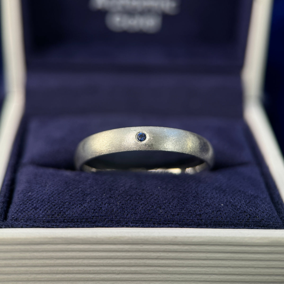 14k White Gold & Flash-set 1.5mm round Lab Sapphire on 4mm Curvy Matte Custom Ring