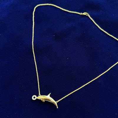 full view of 14k Yellow Gold Pave Diamond Ball Holding 30mm Orca and 14k White Gold Belly on 16" Thick Cable Chain Custom Necklace