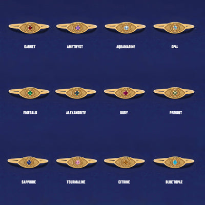 Twelve versions of the solid yellow gold Evil Eye Ring showing the different gemstone options