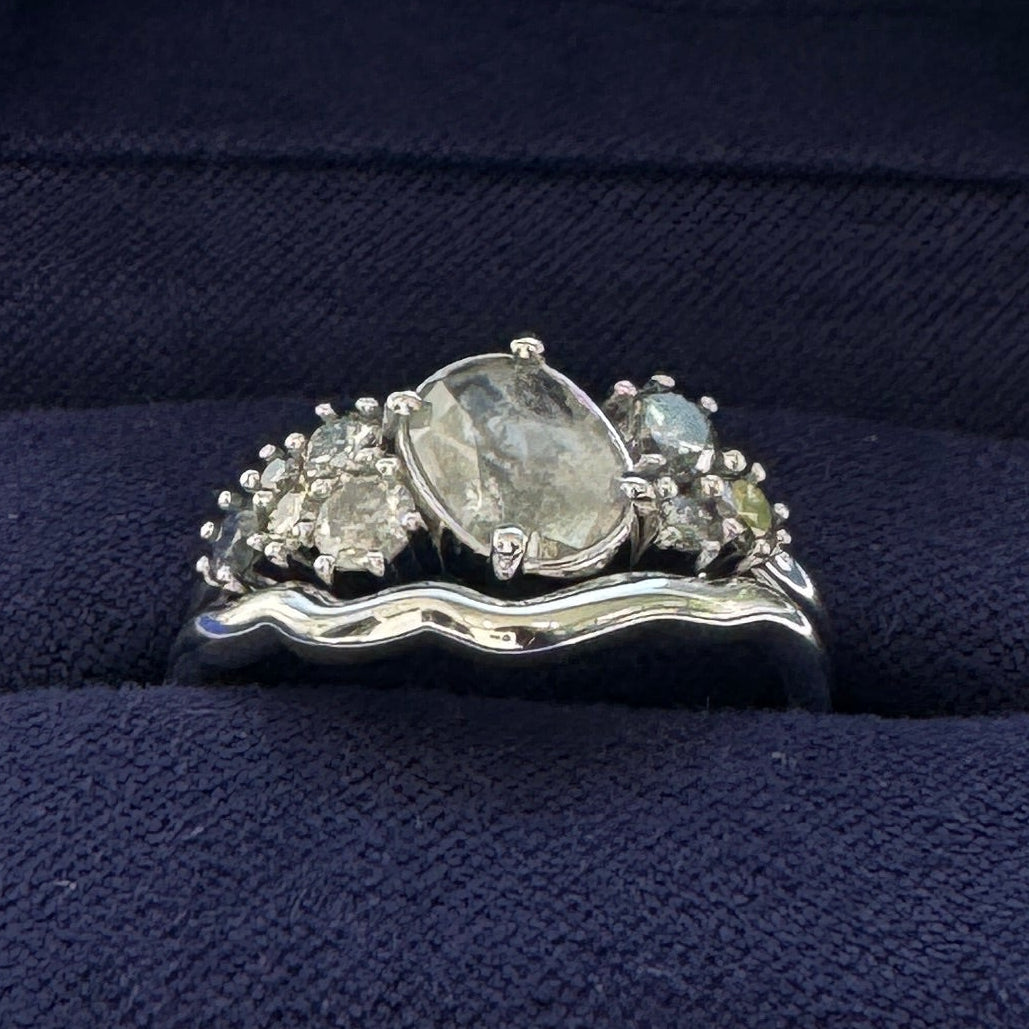 14k White Gold with 0.80ct Oval Salt-and-pepper Diamond with a Cluster of Light and Dark Round Salt-and-pepper Diamonds Custom Ring with 14k White Gold Custom Nesting Band, size 6.75