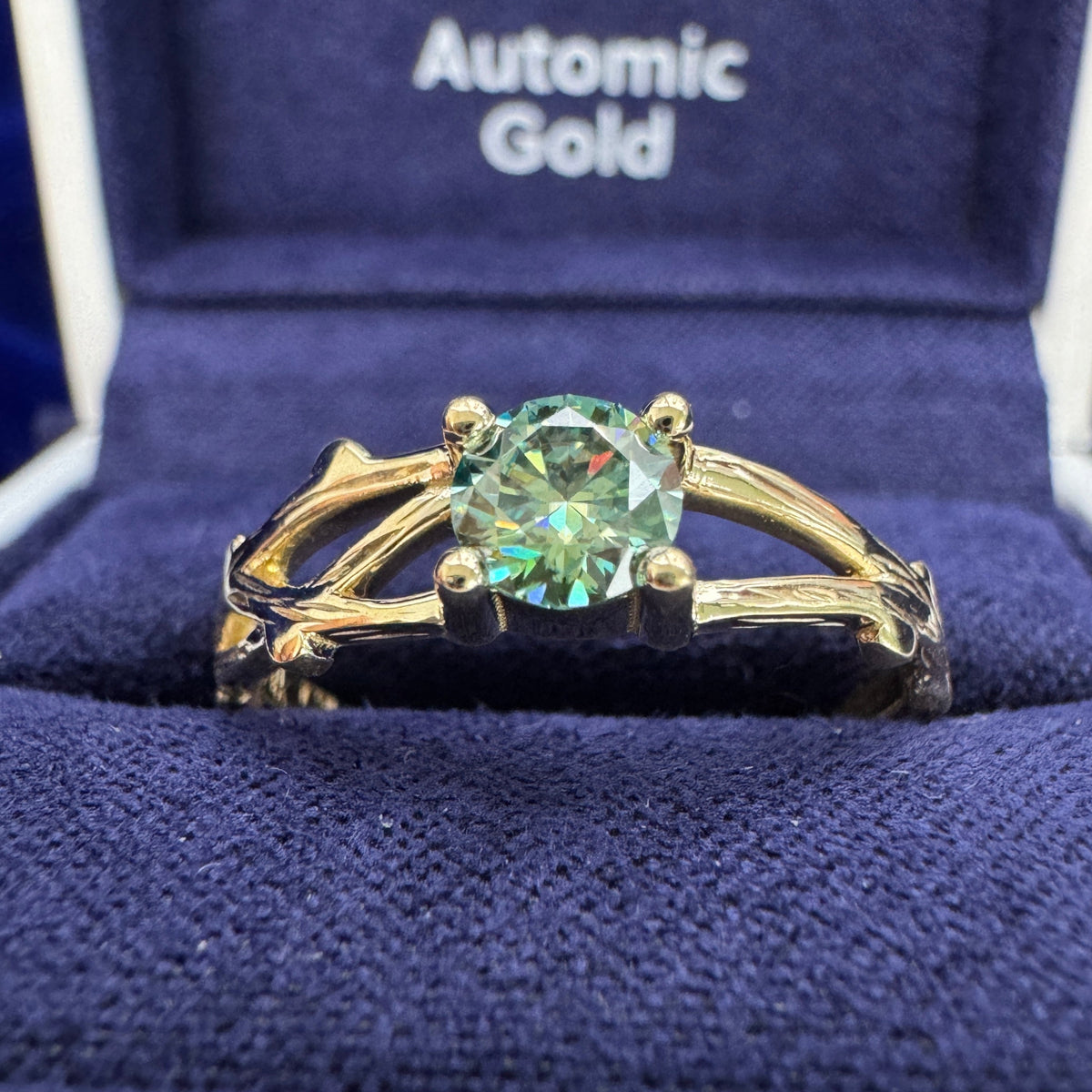 14k Yellow Gold & 4-round-prongs-set 5mm Green Round Moissanite on our Moissanite Branches but Polished Branches Custom Ring, size 8.25
