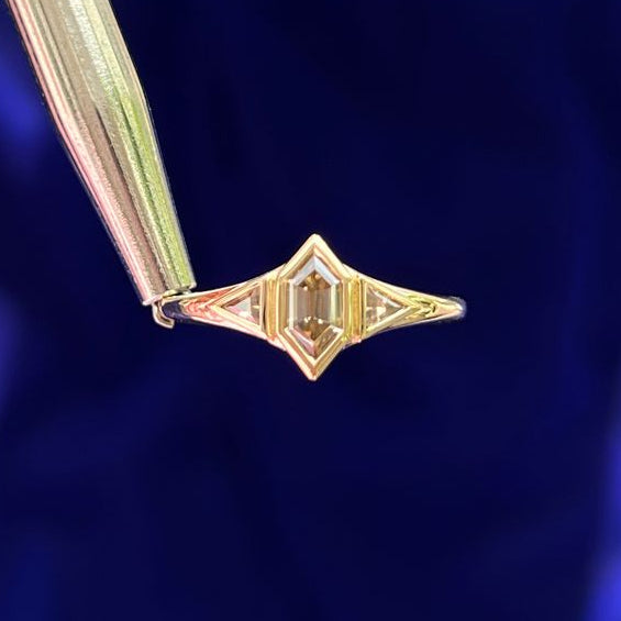 14k Yellow Gold Elongated Hexagon Moissanite with two Trillion Moissanites Custom Ring