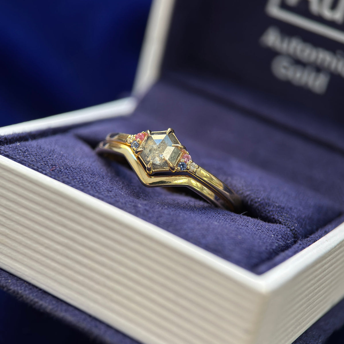 14k Customers Yellow Gold and 0.70ct Hexagon Salt-and-pepper Diamond with Blue, Pink Lab Sapphires and Lab Diamond Custom Ring with 14k Customers Yellow Gold 1.7mm Chevron Nesting Band,, size 11