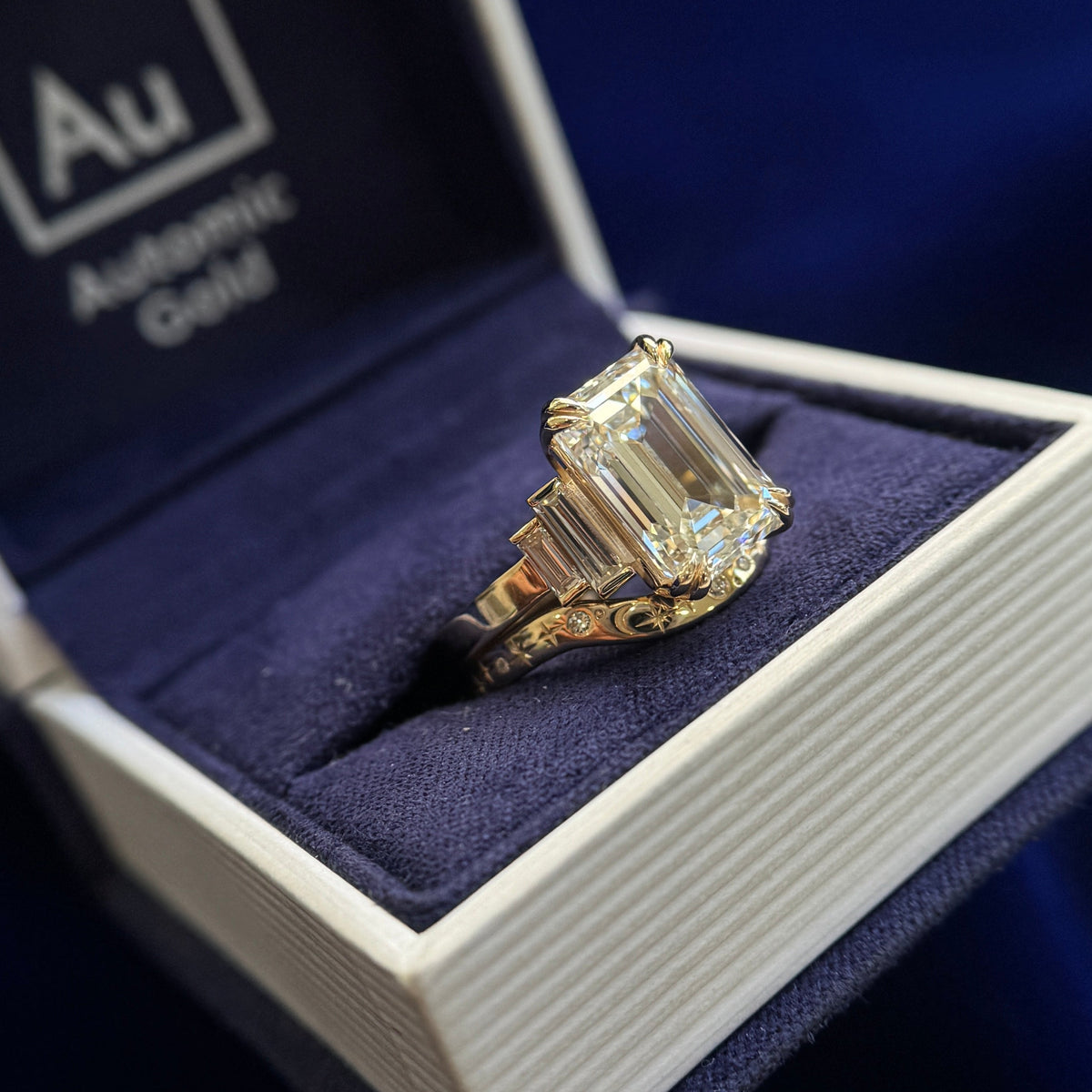 14k Yellow Gold and 5.5ct Emerald-cut Lab Diamond center with 4pc Baguette Lab Diamonds Custom Ring and Nesting Stars Diamonds Moon Sun 2.5mm Band Rings Set, size 7