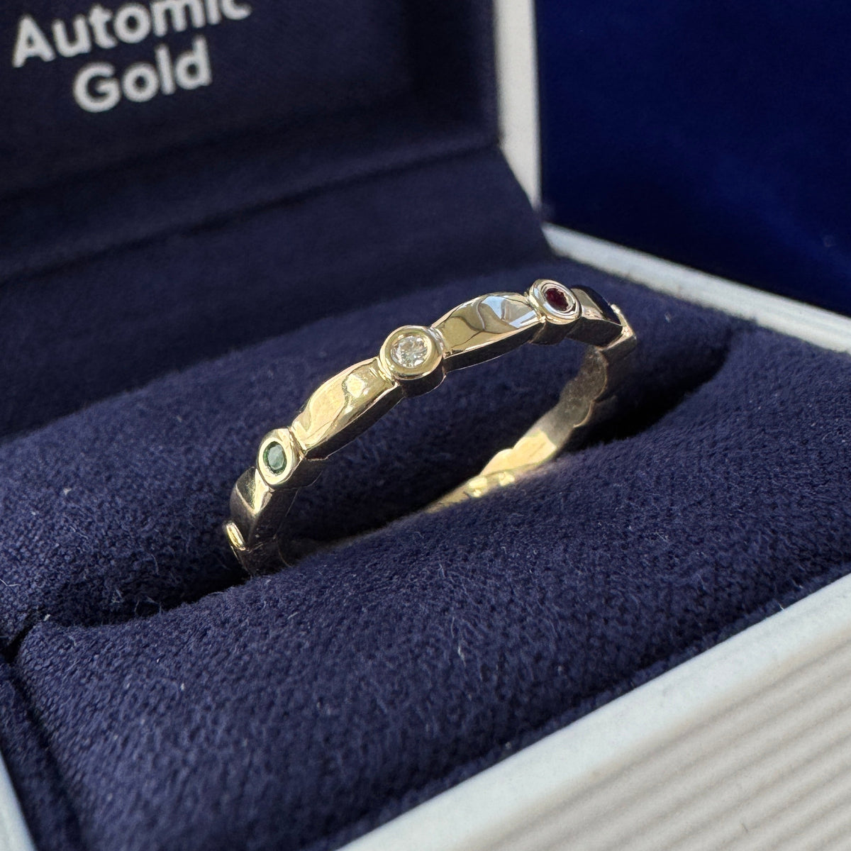 14k Yellow Gold and 9pc Lab Ruby, Lab Emerald, Moissanite Bezel set on Custom Wedding Band, Size 6