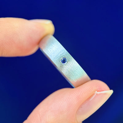14k White Gold Remelted into 6mm Curvy Matte Band & Flash-set 2mm Round Lab Sapphire Custom Ring, size 10.5