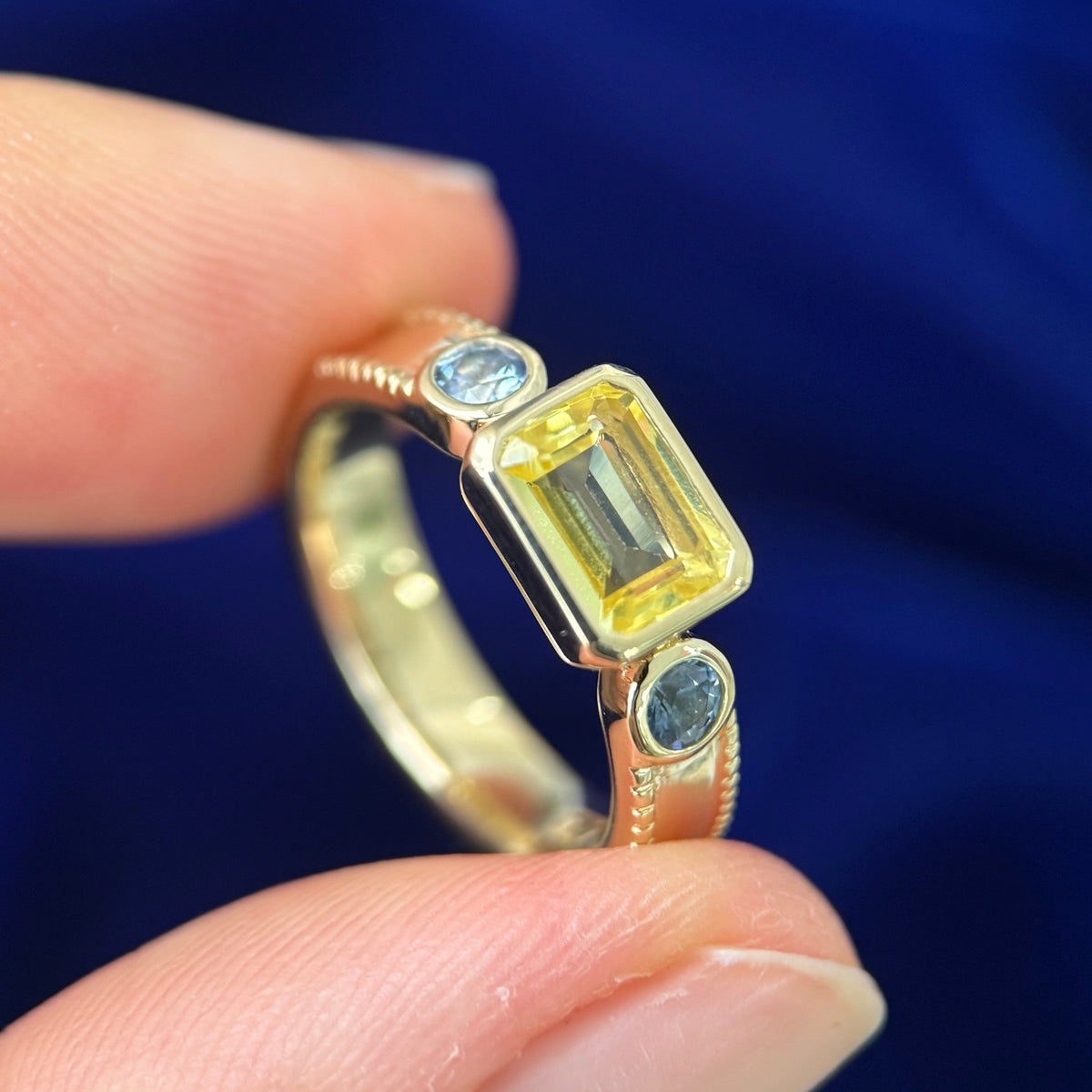 14k Yellow Gold Milgrain-bezel-low-set East-west 8x6mm Emerald-cut Yellow Lab Diamond with 2mm Round Light Blue Sapphires Custom 3-stone Ring, size 4