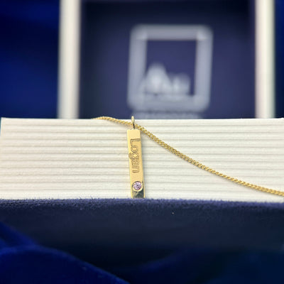 14k Yellow Gold 18" Gemstone Bar Necklace w/ 1.2mm pink sapphire & custom engraving "Logan" on one side "Bryce" on the other side