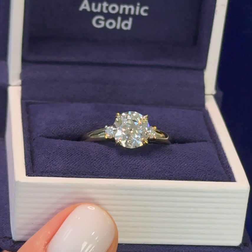 A 14k Yellow Gold Double-claw-prongs-set Custom-grown ~2ct 8mm Round Old Mine Cut Lab Diamond w/ 2pc Customer’s Small Round Diamonds Custom Vintage Inspired Ring in a blue ring box