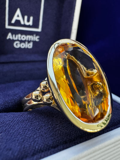 14k Yellow Gold & Open-bezel-set Customer’s 14.5ct Oval Citrine with 6 Beads on Double Band Custom Ring in a blue box