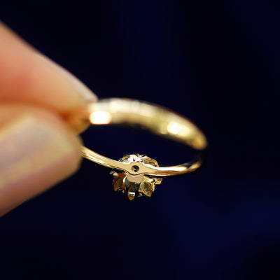 Underside view of a solid 14k gold Diamond Petal Ring