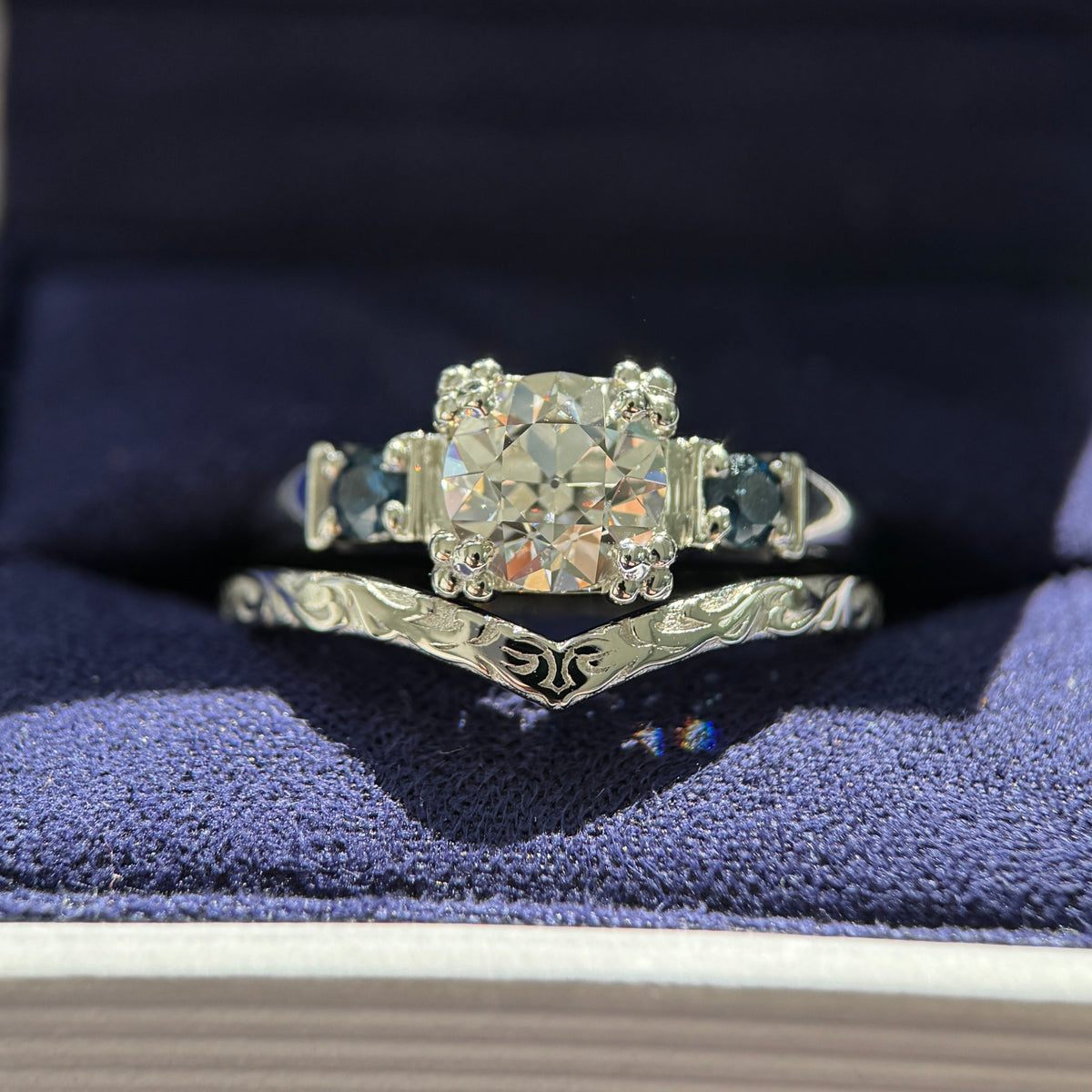 950 Platinum & 4-Leaf-prong-set 1.5ct Antique-cut Round Lab Diamond with 2pc 3mm Customer’s Sapphires Custom Ring with 960 Platinum Custom Nesting Filigree Band