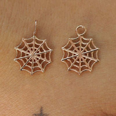 Two 14 karat Rose solid gold Spider Web Charms shown in the For Chain and For Earring options