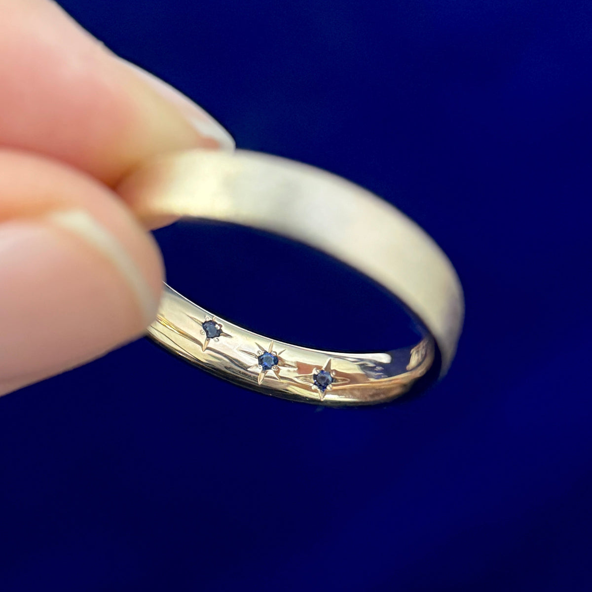 14k Yellow Gold 4mm Mix Stardust Band Custom Ring, Engraved Inside with 3 blue sapphires star set inside the band, Size 9