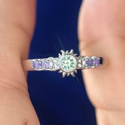 14k White Gold Bezel-set Light Green Sapphire with Small Purple Sapphires on Custom Sun and Moon Ring, Size 7.5