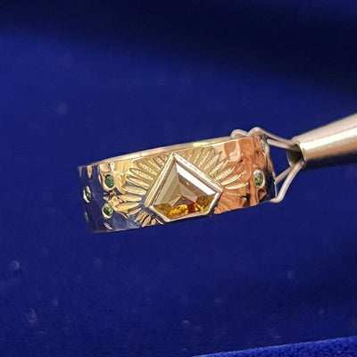 14k Yellow Gold 1ct Shield Cut Brown Sapphire with Small Round Green Diamonds on Hammered Finish Thick Band Custom Ring