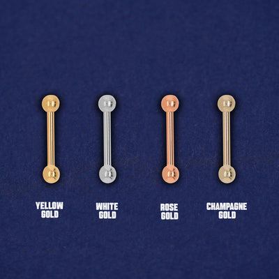 Four versions of the Small Straight Barbell Piercing in yellow, white, rose and champagne gold