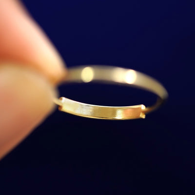 Underside view of a solid 14k gold Bar Ring