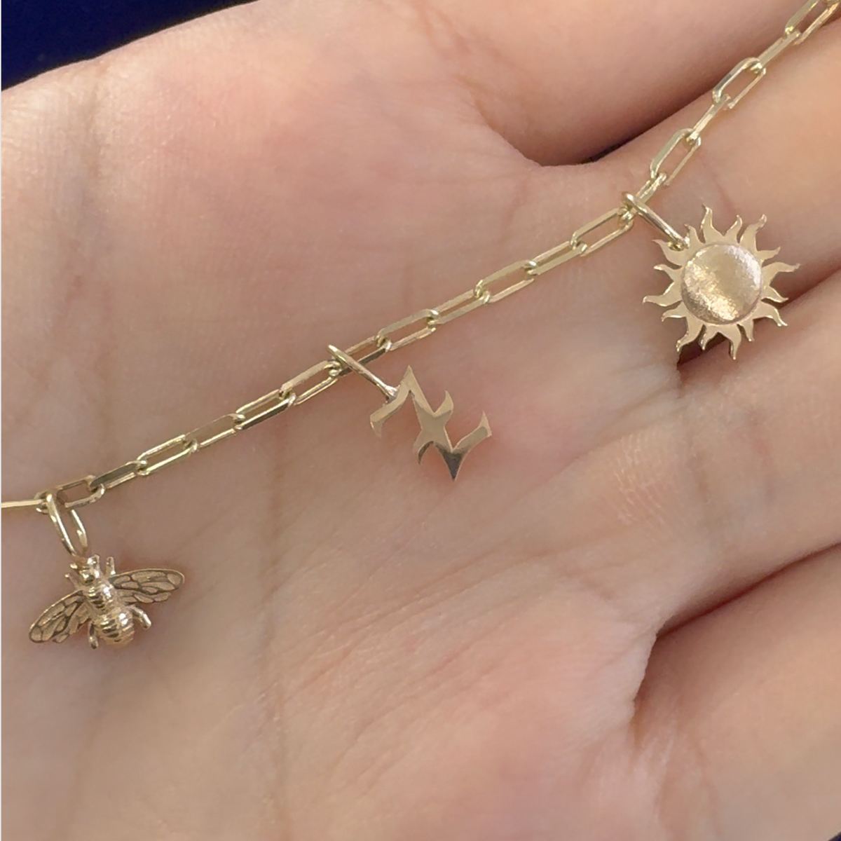 14k Yellow Gold Sun, Hamsa, Initial Z, Watermelon and Custom 10mm Bee Charms Soldered onto 5.5inch Butch Bracelet