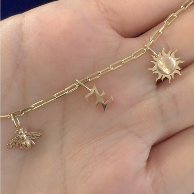 14k Yellow Gold Sun, Hamsa, Initial Z, Watermelon and Custom 10mm Bee Charms Soldered onto 5.5inch Butch Bracelet