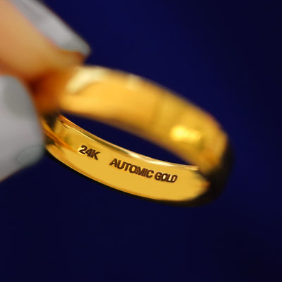 Underside view of a solid 14k gold 24k Mix Mirror Band