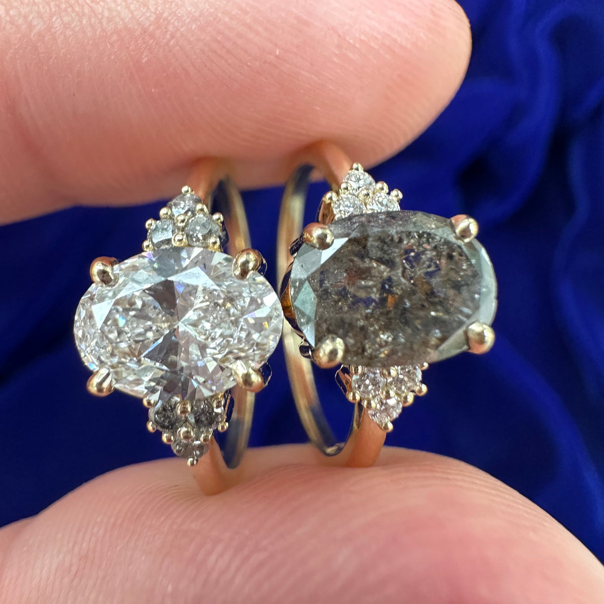 14k Yellow Gold Matching Couple Engagement Rings, one in 1.66ct Oval Salt-and-pepper Diamond Center and Small Lab Diamonds side, second ring is with 1.18ct Oval Lab Diamond center and Small Salt-and-pepper Diamonds sides