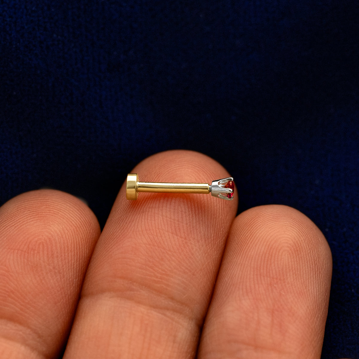 Side view of a solid 14k rose gold 2mm Gemstone Flatback Piercing 