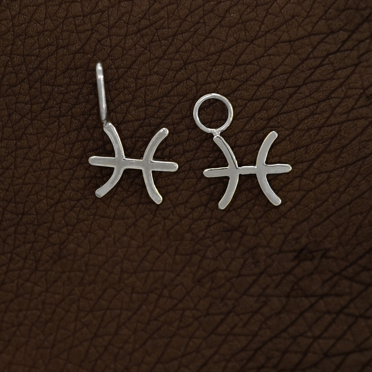 Two 14 karat White solid gold Pisces Horoscope Charms shown in the For Chain and For Earring options