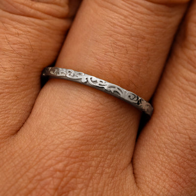 Close up view of a model's fingers wearing a 14k white gold Thin Filigree Band