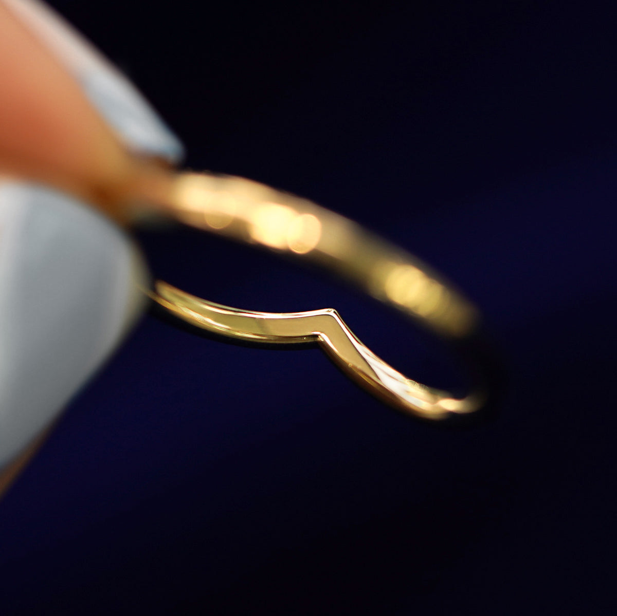 Underside view of a solid 14k gold Chevron Band