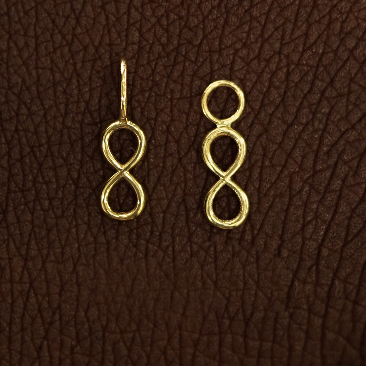 Two 14 karat Yellow solid gold Infinity Charms shown in the For Chain and For Earring options

