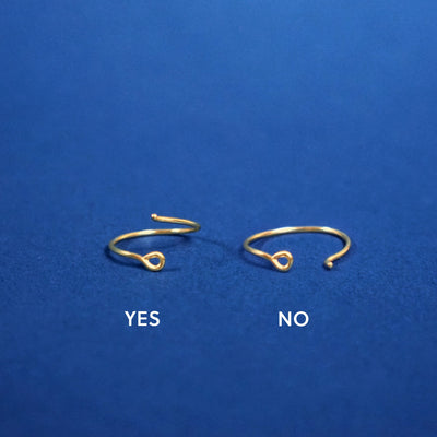 A pair of Medium Hoops showing the correct way to open the hook closure