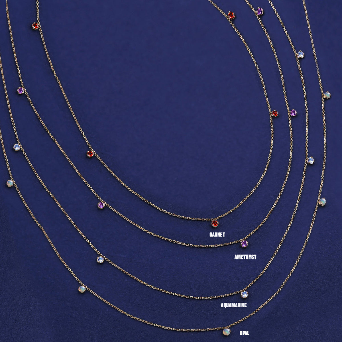 Four versions of the solid yellow gold 5 Gemstone Cable Necklace showing different stone options