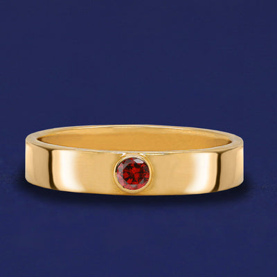A solid yellow gold january birthstone Garnet Gemstone Industrial ring