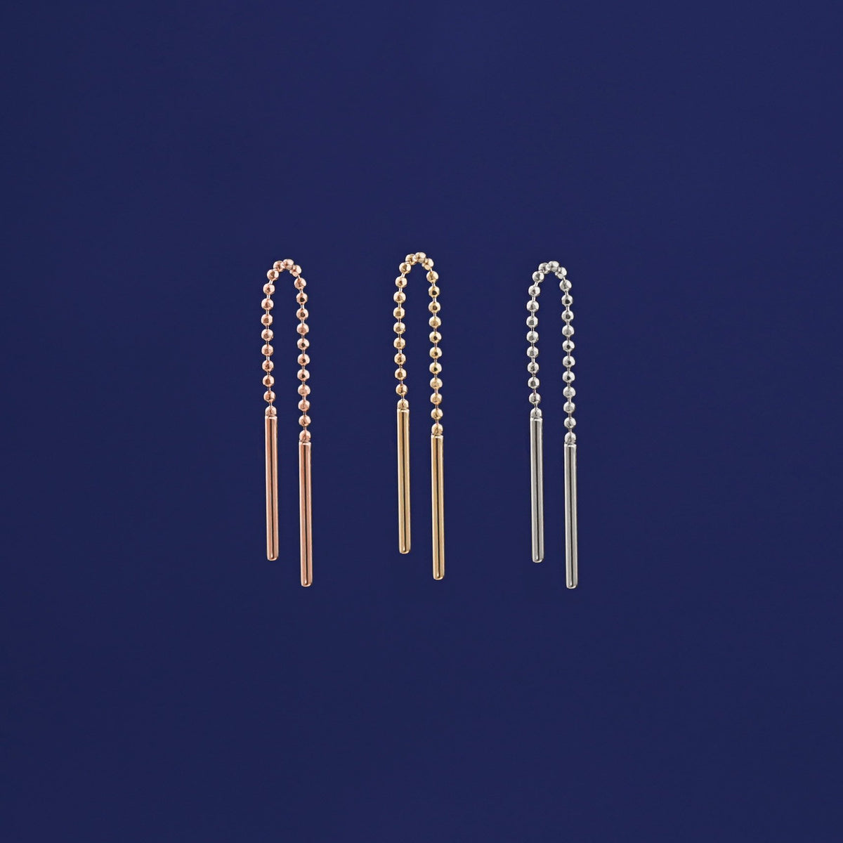 Three versions of the Mini Threader shown in options of rose, yellow, and white gold